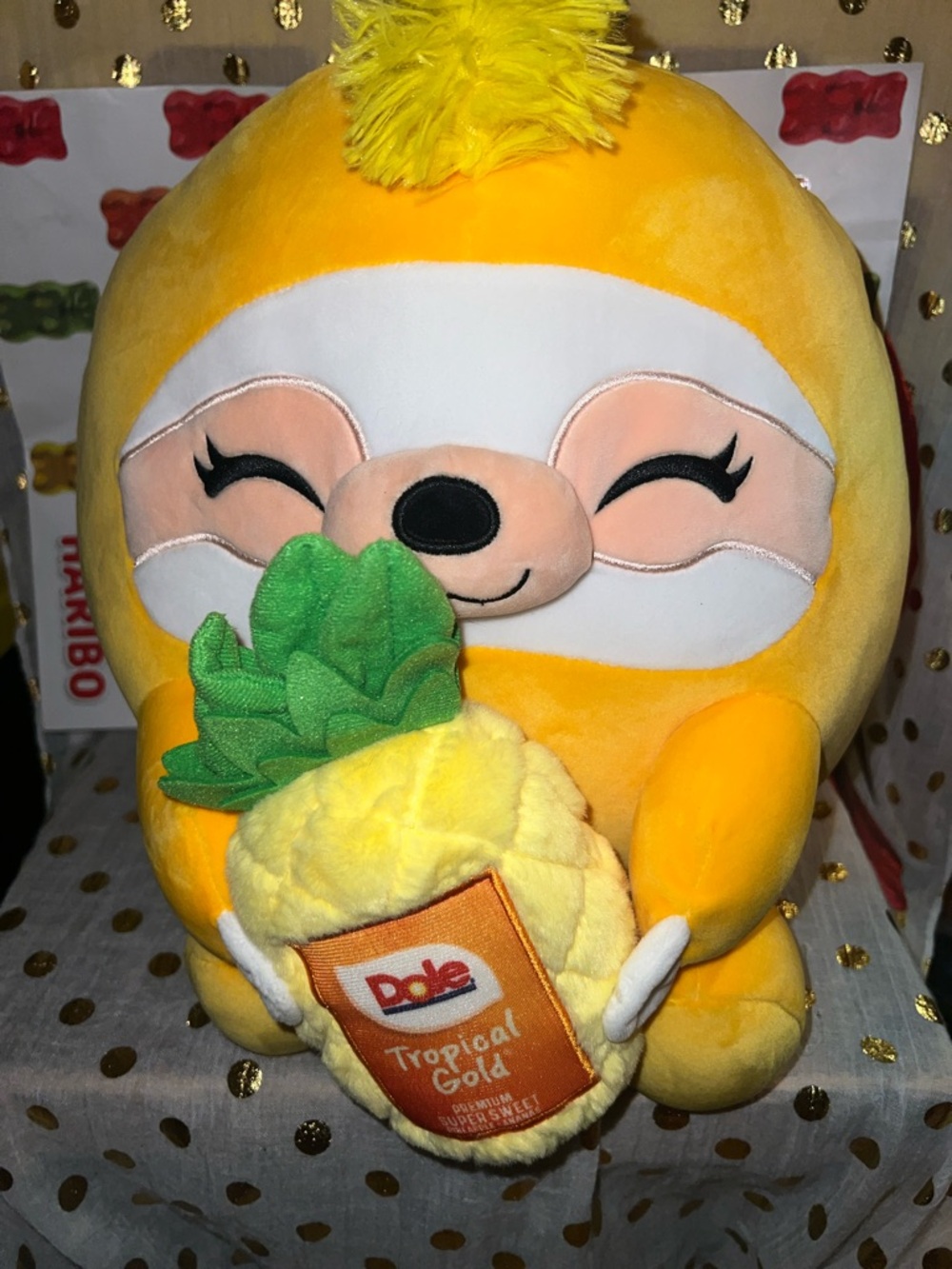 DoleYellow Sloth Plush Holding Dole Pineapple